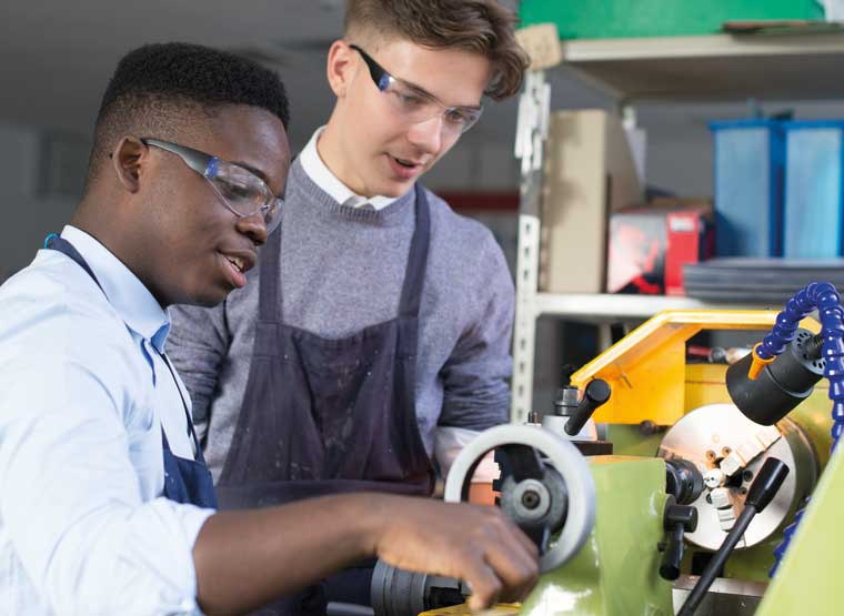 Student working at lathe