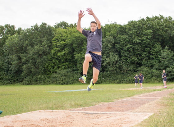 Boy long jumping